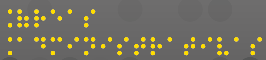Imagem: Texto ‘Áreas Administrativas’ escrito em pontos braille em amarelo. Fim da imagem.