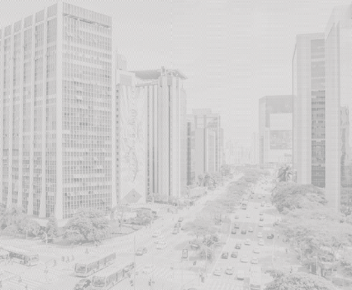Imagem: Fotografia em preto e branco referente às páginas 38 e 39. Uma avenida com faixas de trânsito com veículos e calçadas com árvores e pessoas. À direita e à esquerda há prédios altos de vidro. Árvores estão distribuídas entre as calçadas e canteiros centrais. Fim da imagem.